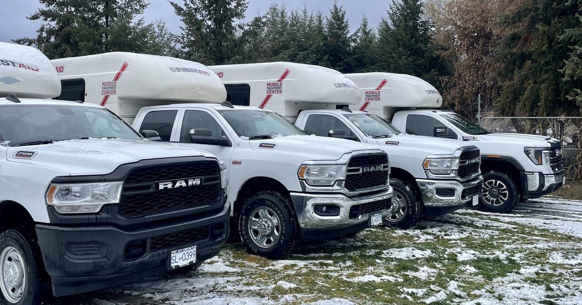 Four Vital Safety Mobile Treatment Centre trucks lined up, ready to dispatch to industrial sites